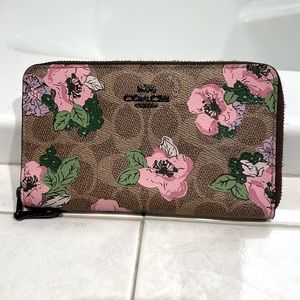 EUC Coach Wallet in Signature Logo Background with Pink and Lavender Flowers